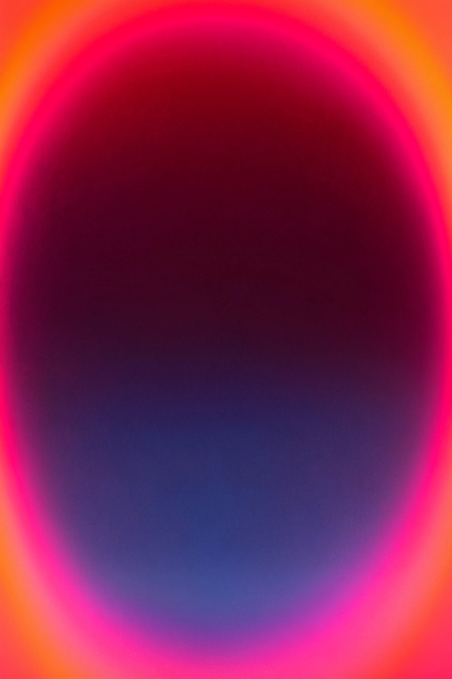 Abstract, soft-gradient composition with a glowing, almost neon-like feel. At the center