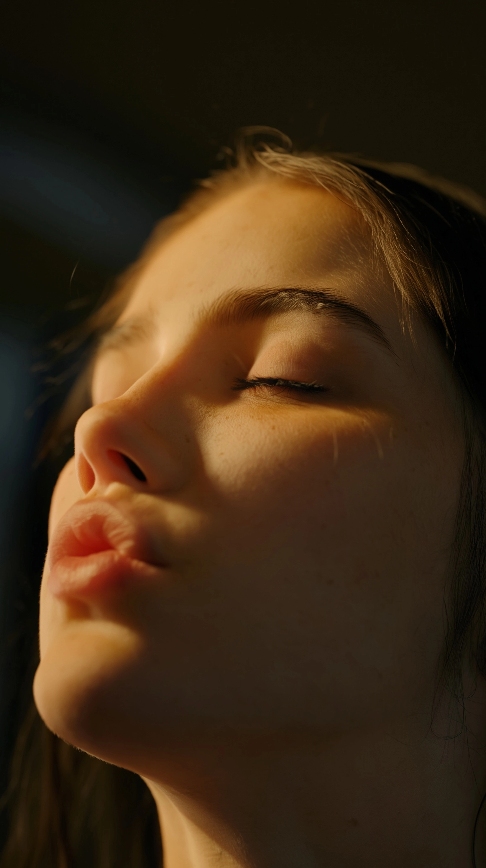 Vertical video, 9:16, ultra realistic cinematic close-up. Use the person from the reference image as