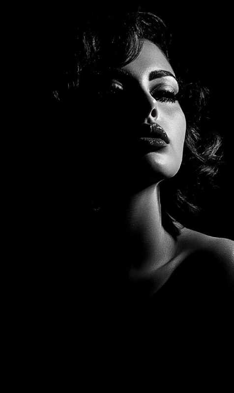 Femme Fatale Against Solid Black Background