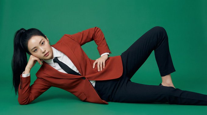 Beautiful Korean woman in red blazer fashion editorial
