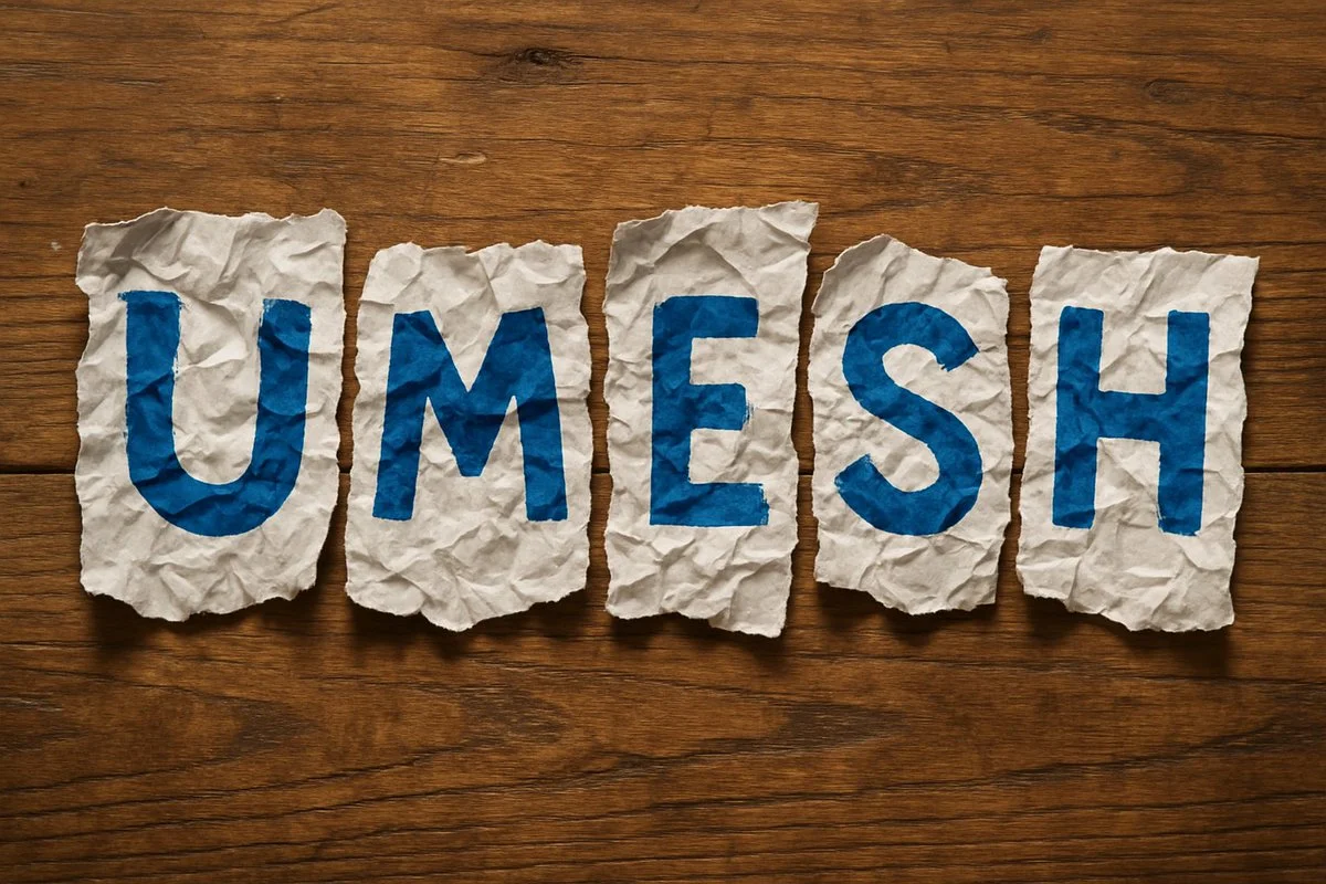 Photorealistic image of torn paper spelling [NAME]