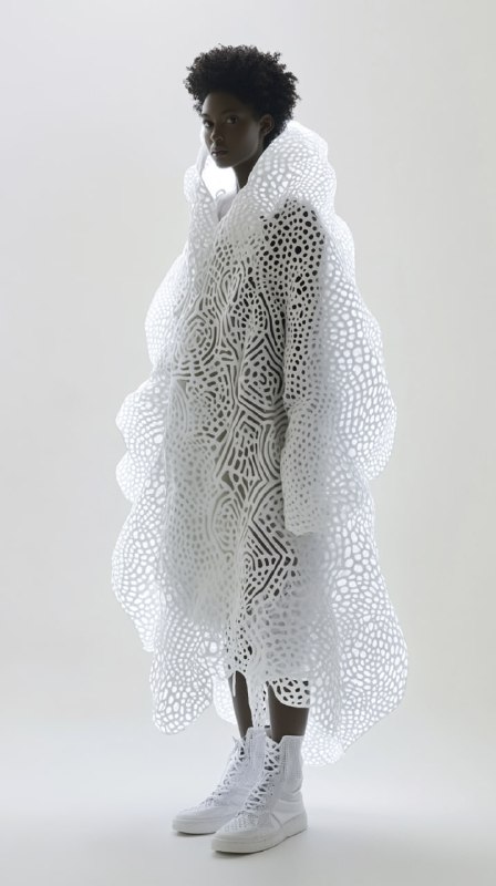 Model in Voluminous White Peacock Coat