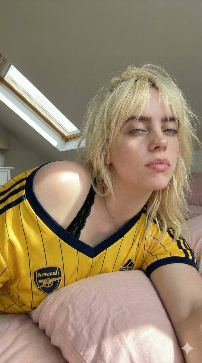 Girl in Yellow Jersey Loft Selfie