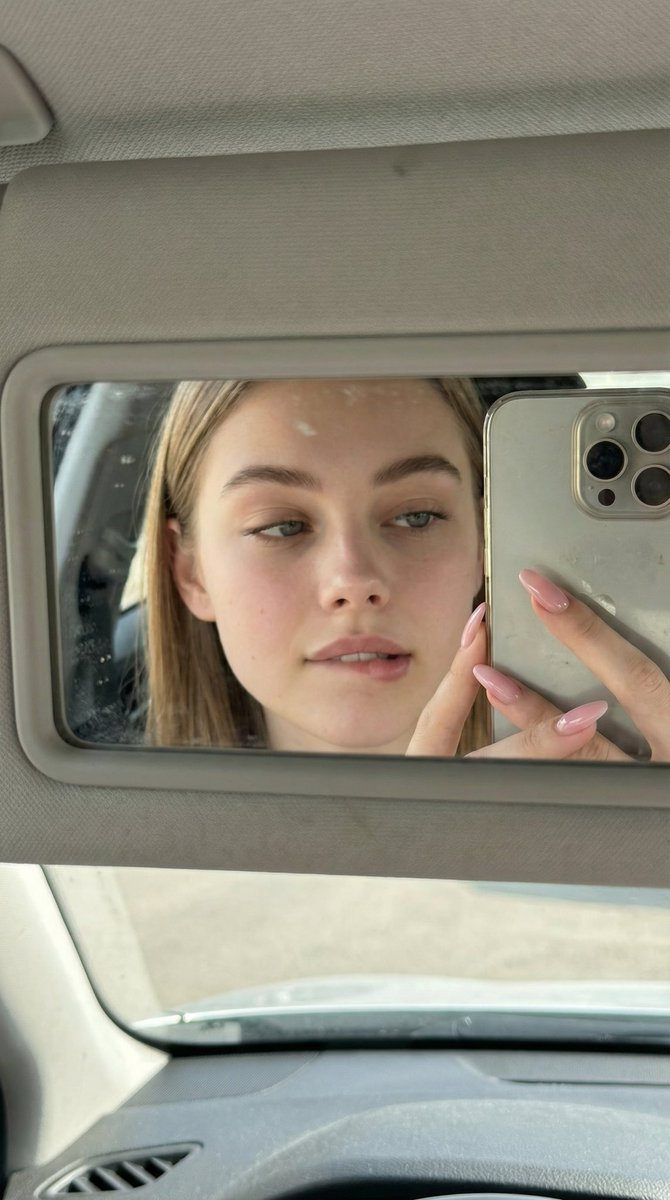 Playful Visor Mirror Selfie