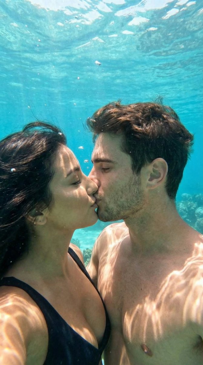 Romantic Underwater Couple Kiss