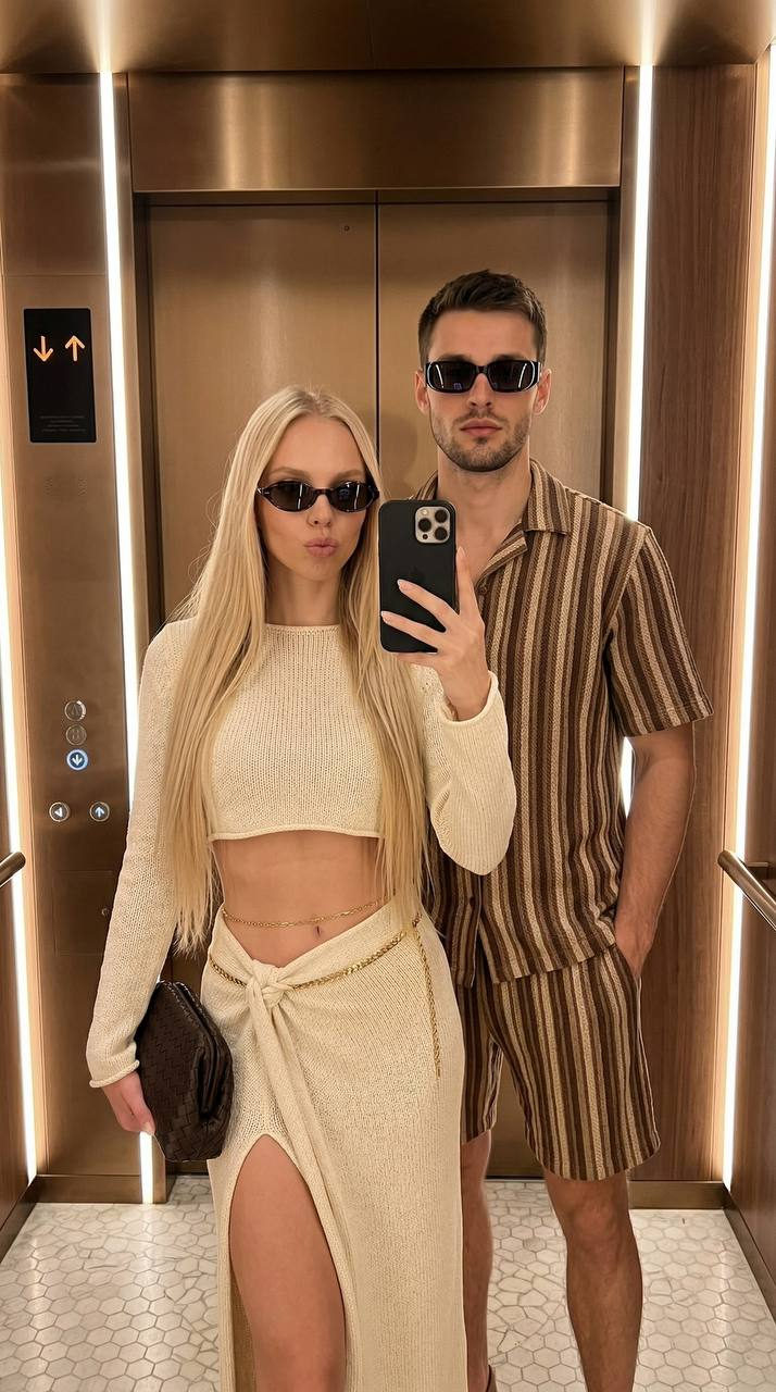 Stylish Couple Elevator Selfie