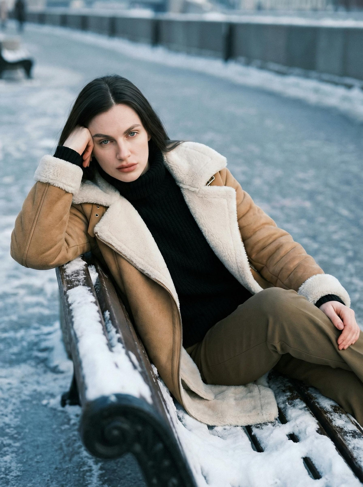 Winter Gaze on Snow-Dusted Bench