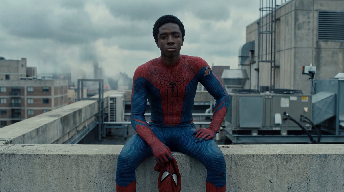 Spider-Man Pensive on Rooftop Edge