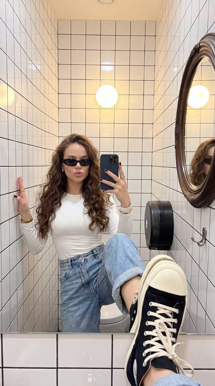 Bold Restroom Mirror Fashion Selfie