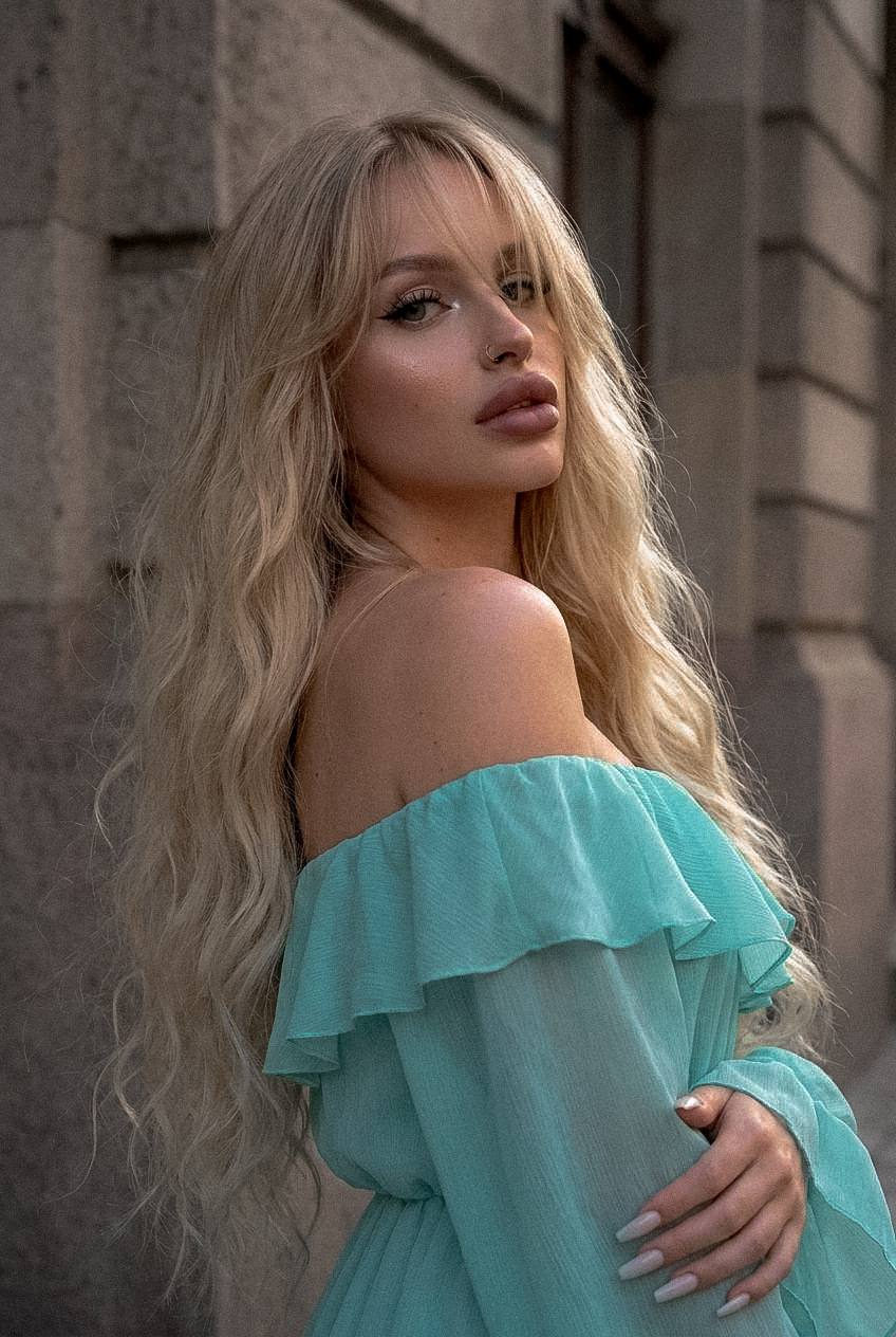 Voluminous Curls in Urban Glow