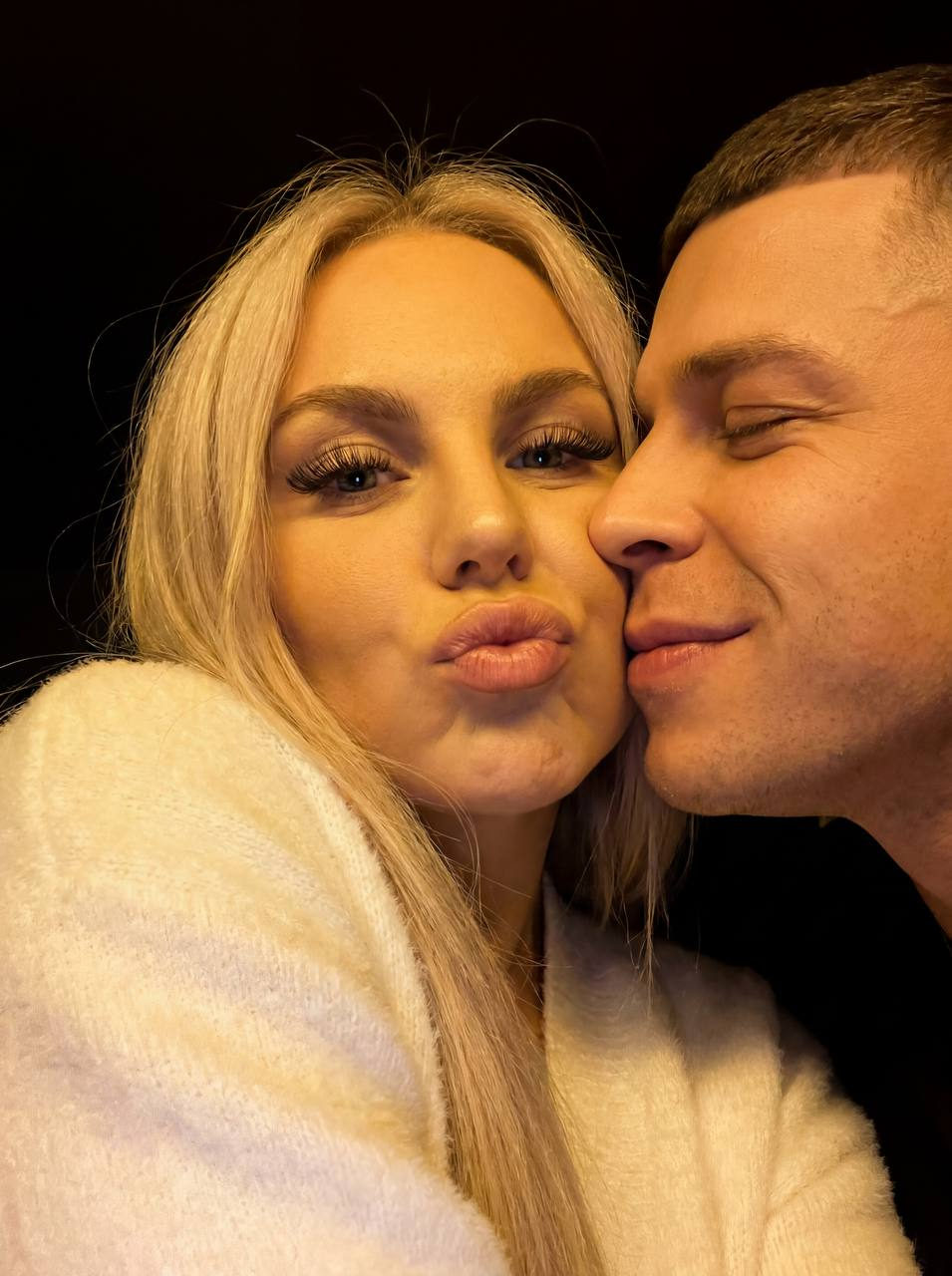Playful Cheek-to-Cheek Selfie