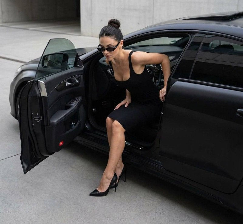 Elegant Woman Exits Luxury Mercedes