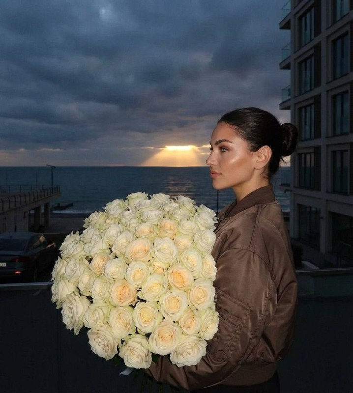 Girl With Roses At Twilight