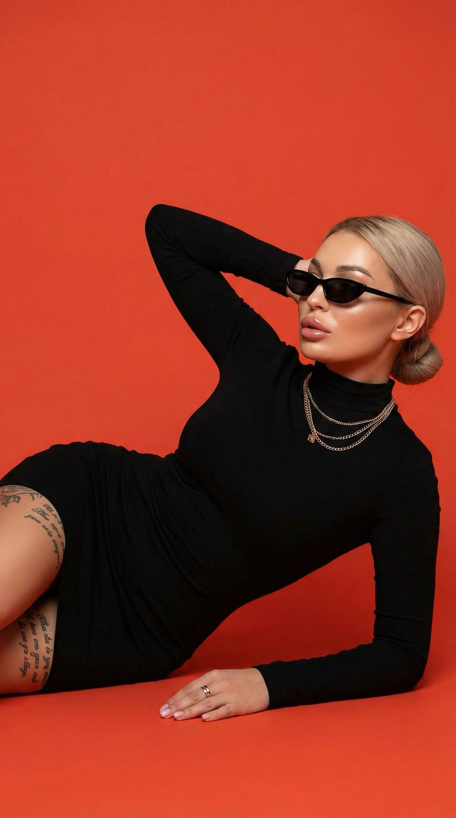 Bold Elegance: Black Dress in Fiery Light