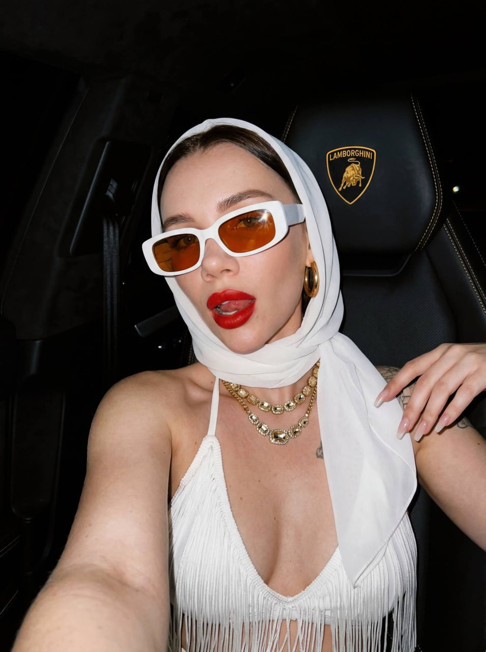Stylish Woman In Lamborghini Interior