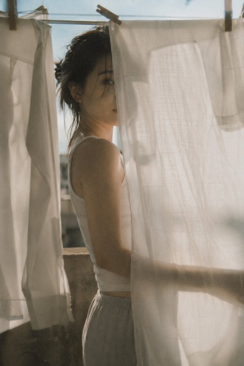 Silhouette in Sunlit Laundry