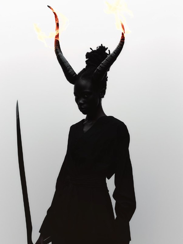 Horned Woman Wielding Flaming Sword Dark Portrait