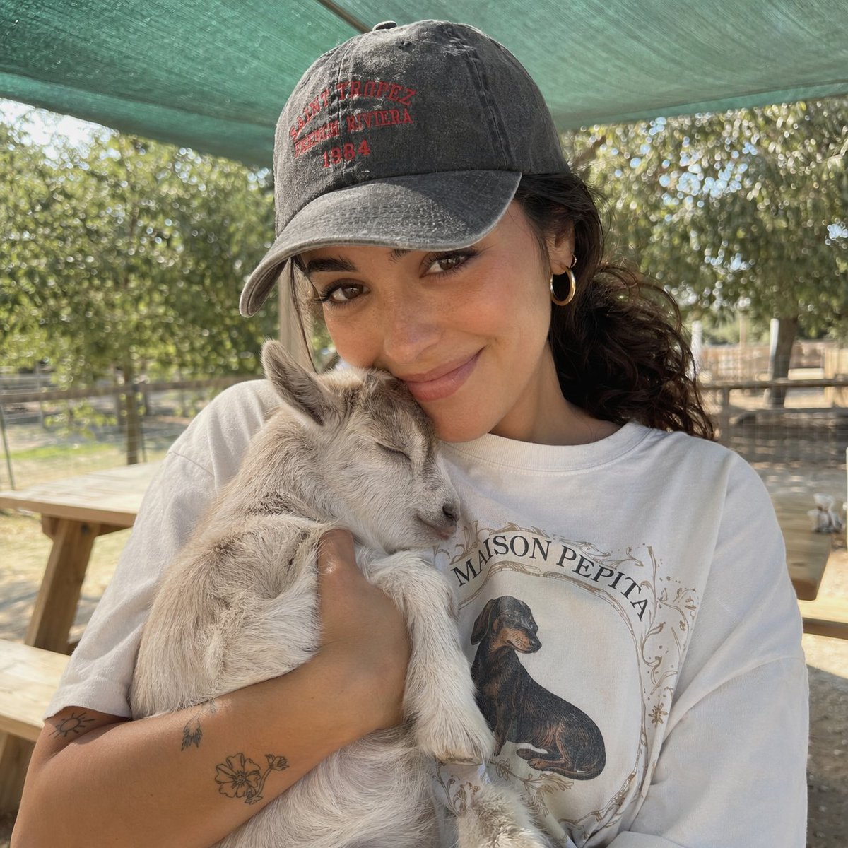 Girl Holding Baby Goat Portrait