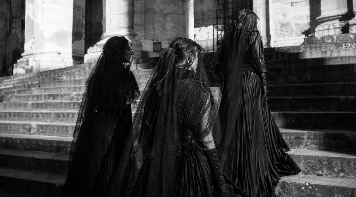 Gothic Mourners Ascending Stone Steps