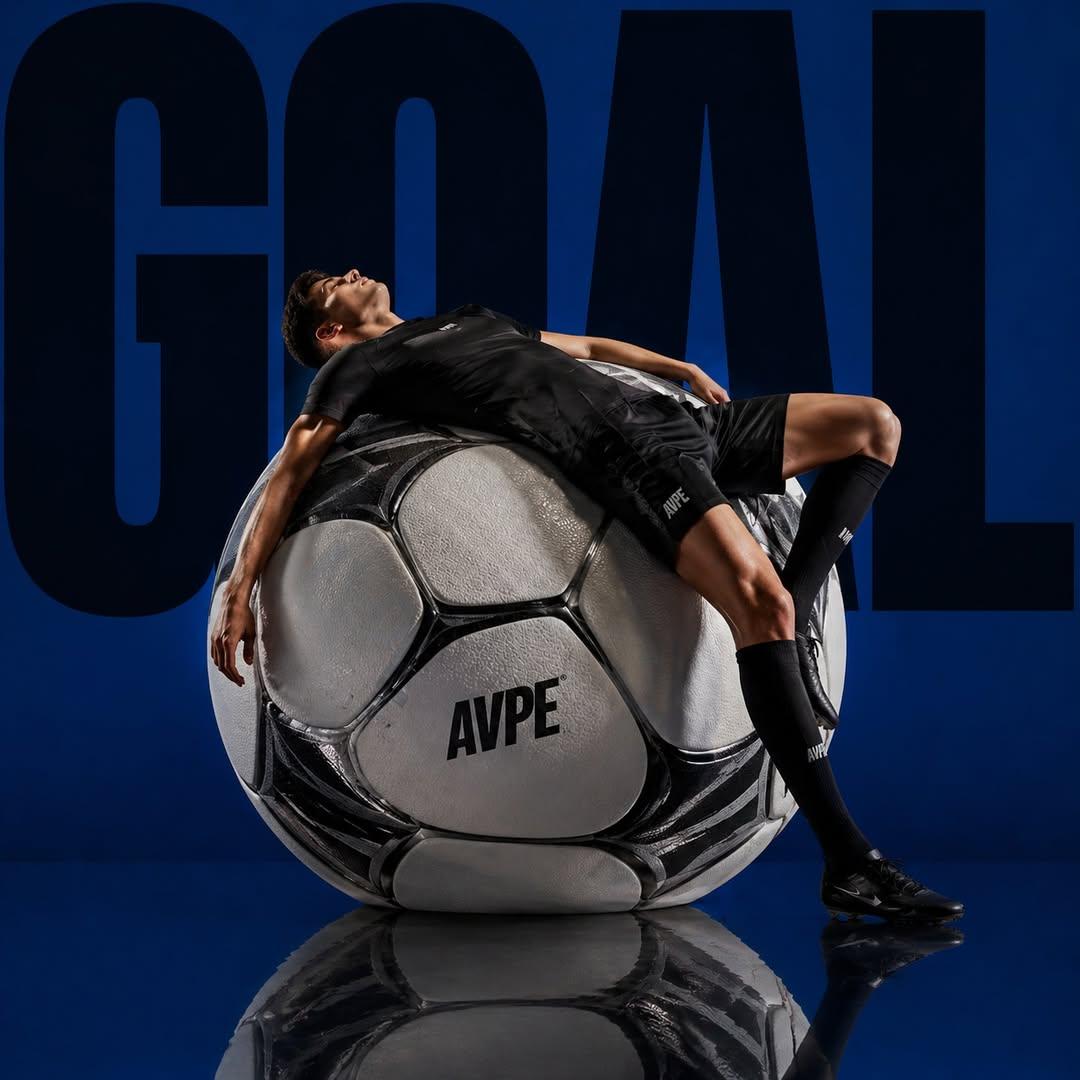 Soccer Star Reclines on Giant Ball