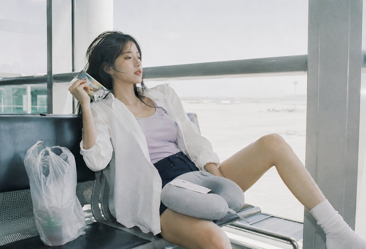 Korean Idol in Airport Morning Light