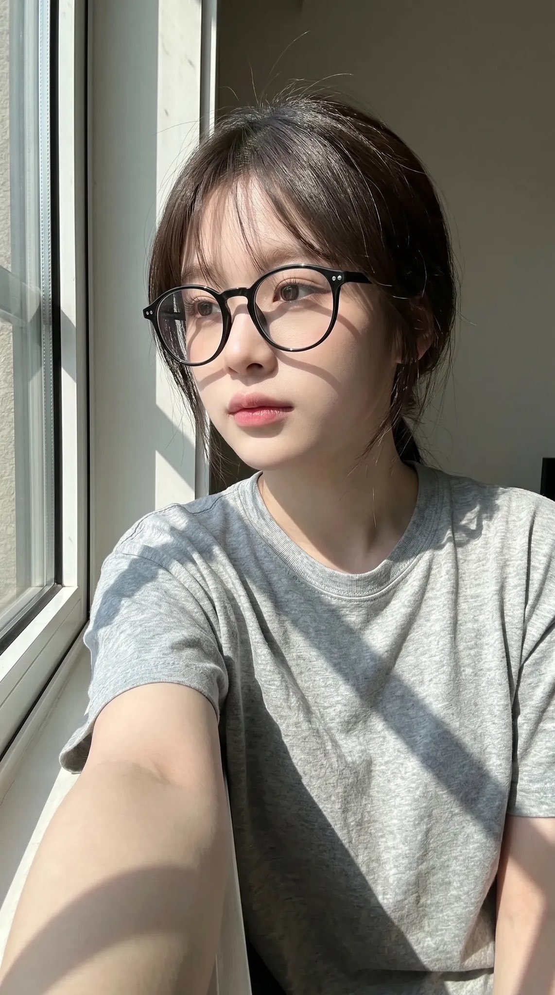Sunlit Window Selfie Portrait