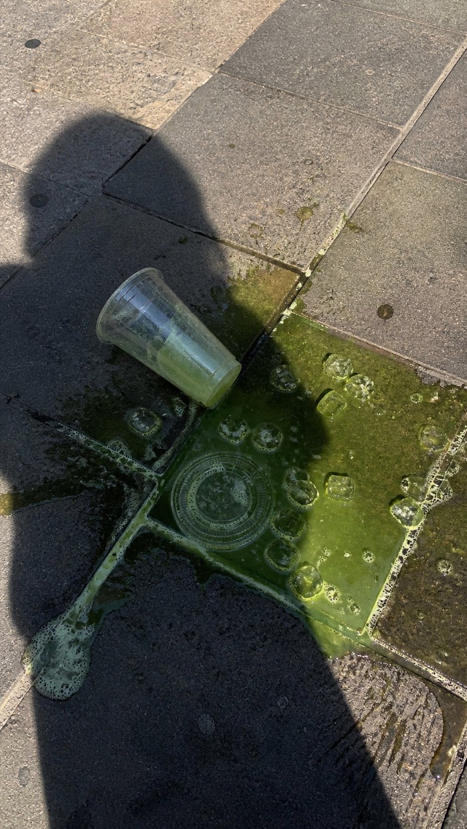 Spilled Green Drink Street Moment