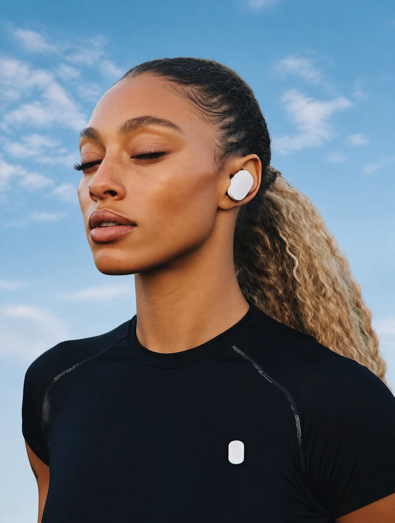 Confident Woman With Wireless Earbuds Outdoors