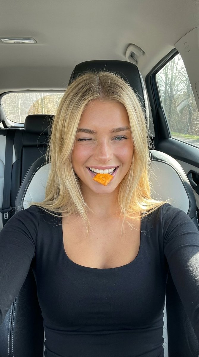 Blonde Girl Snacking In Car