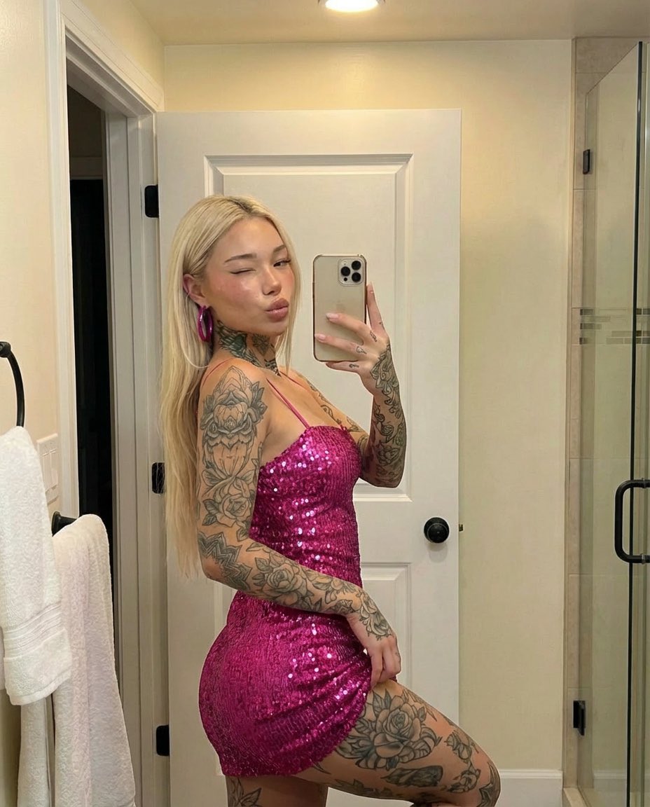 Tattooed Woman Mirror Selfie