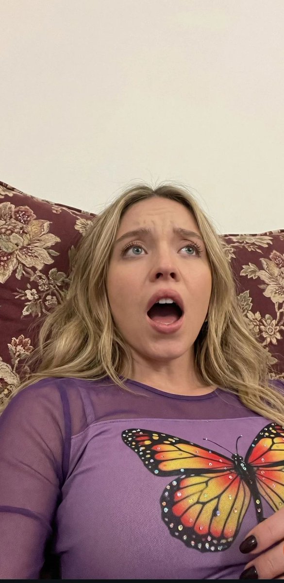 Shocked Blonde in Butterfly Top