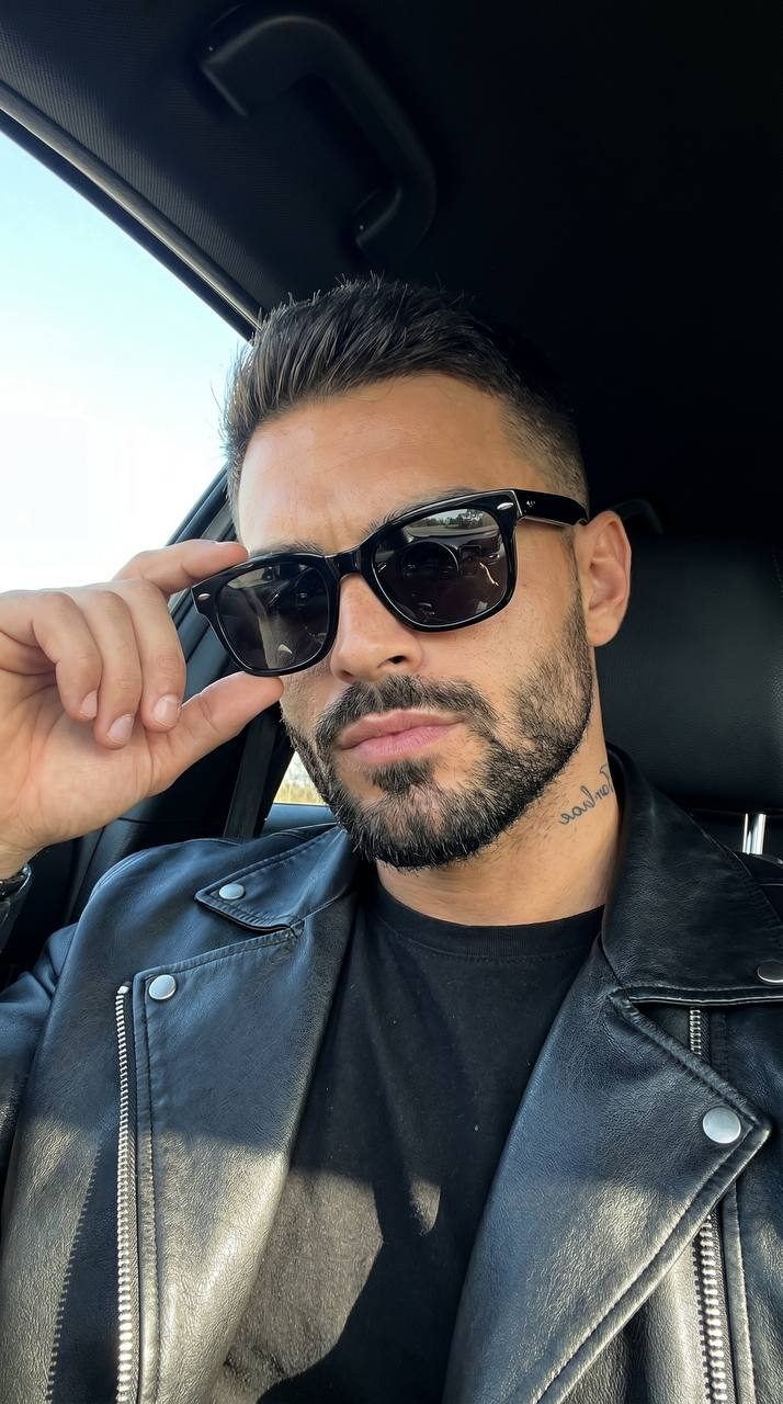 Confident Man Selfie in Car Interior