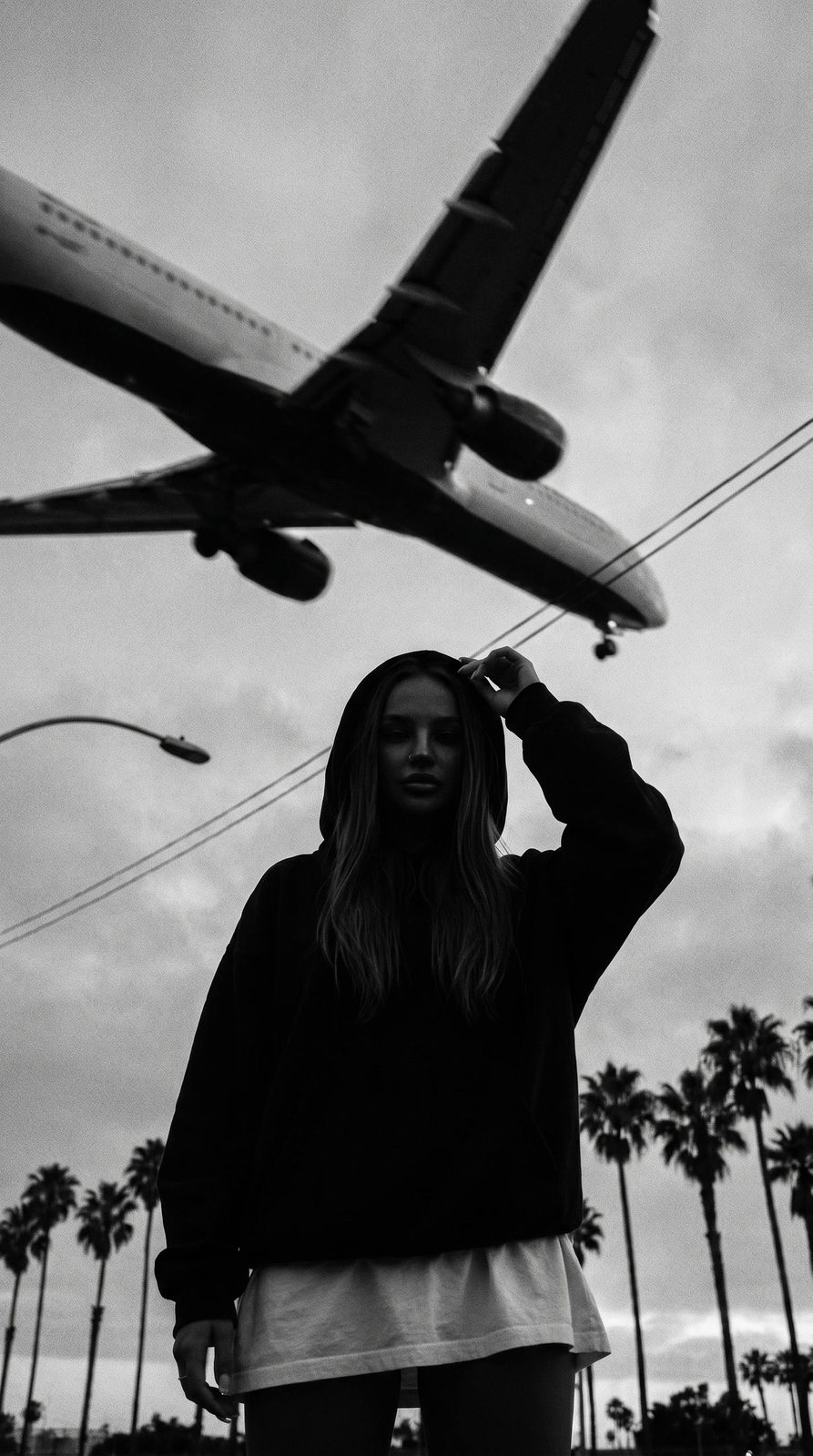 Mystery Girl Beneath Dusk Airplane