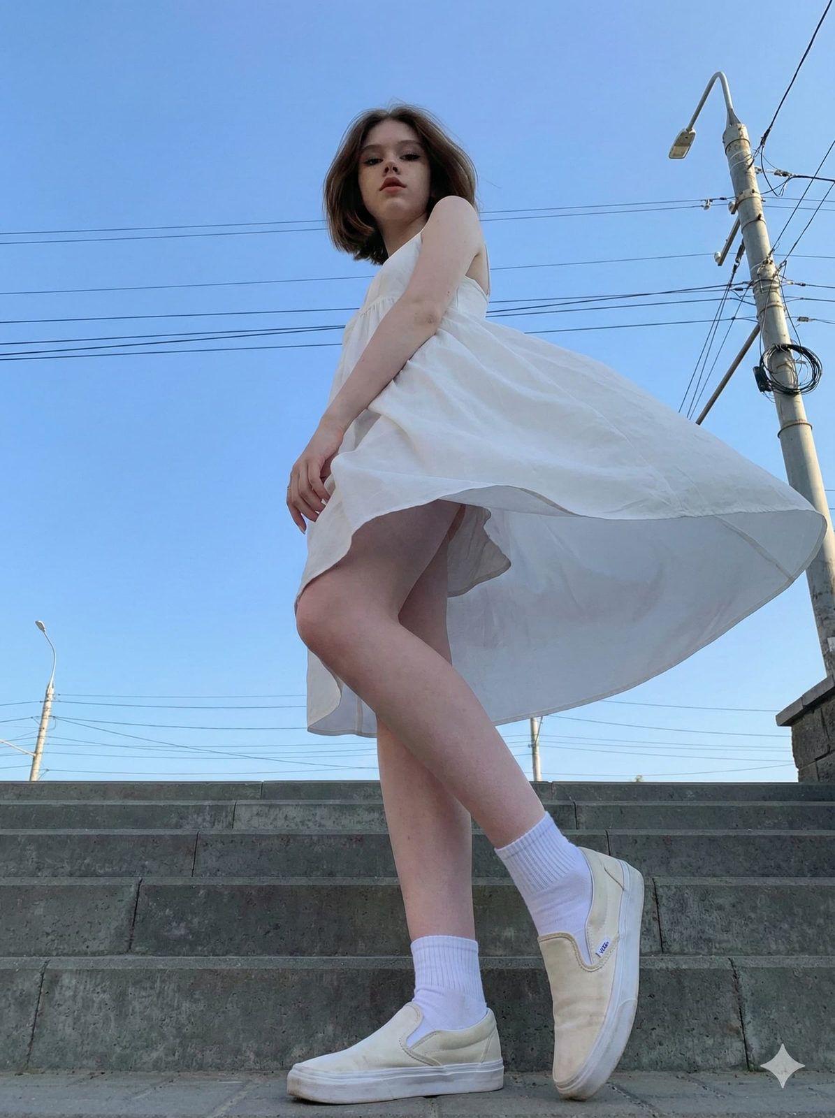 Confident Girl in White Dress