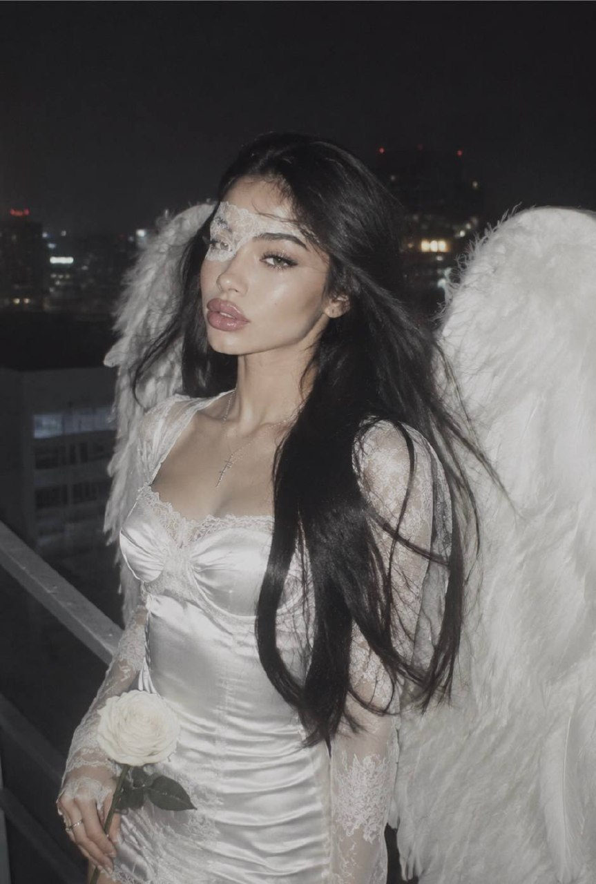 Fallen Angel on Rooftop at Night