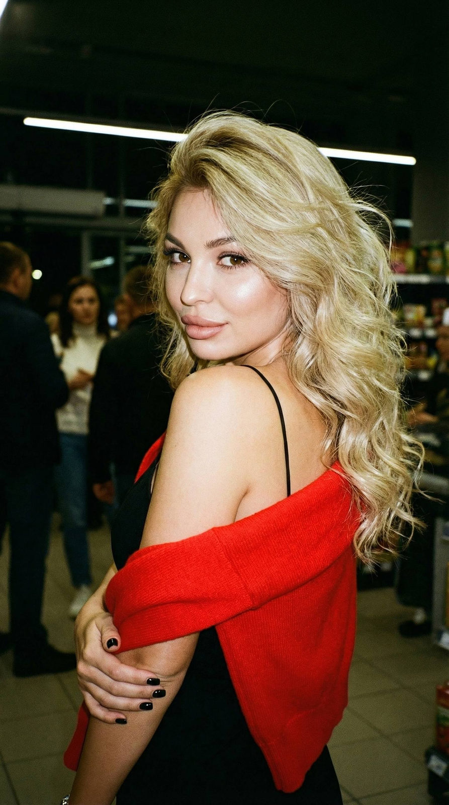 Night Store Girl in Red Sweater