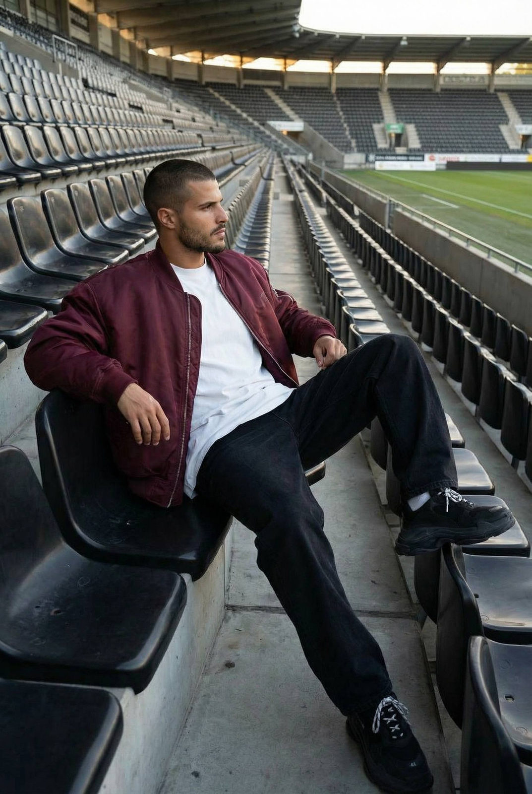 Man Lounging Empty Stadium Editorial