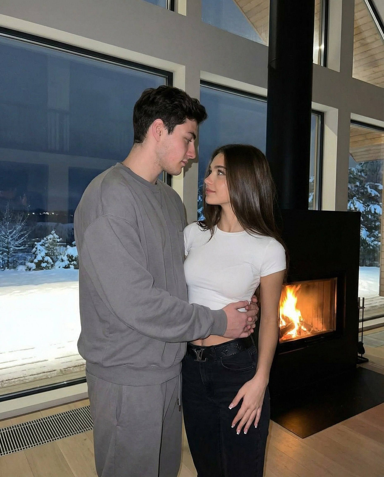 Couple Embracing by Winter Fireplace