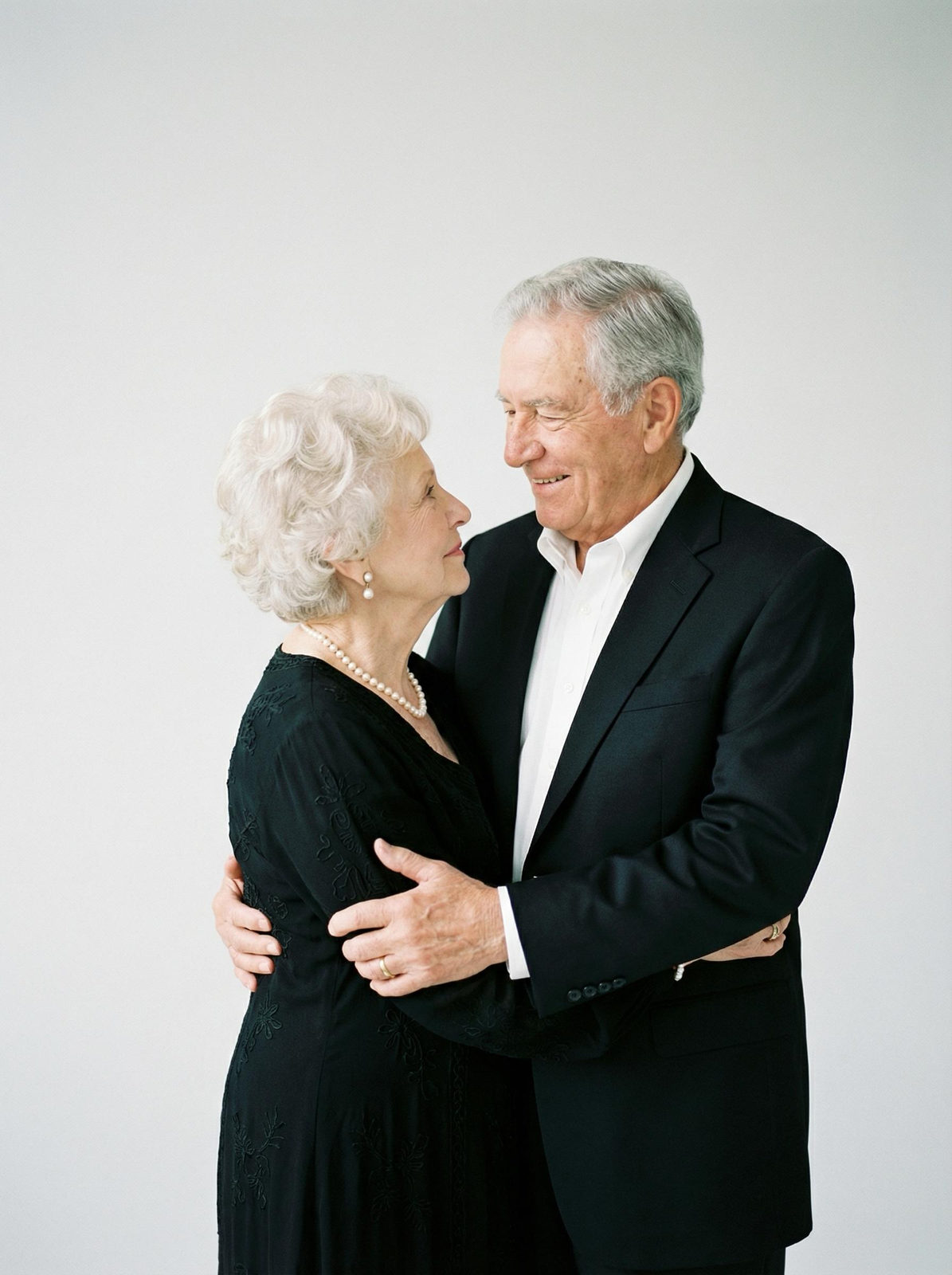 Elderly Couple Tender Embrace