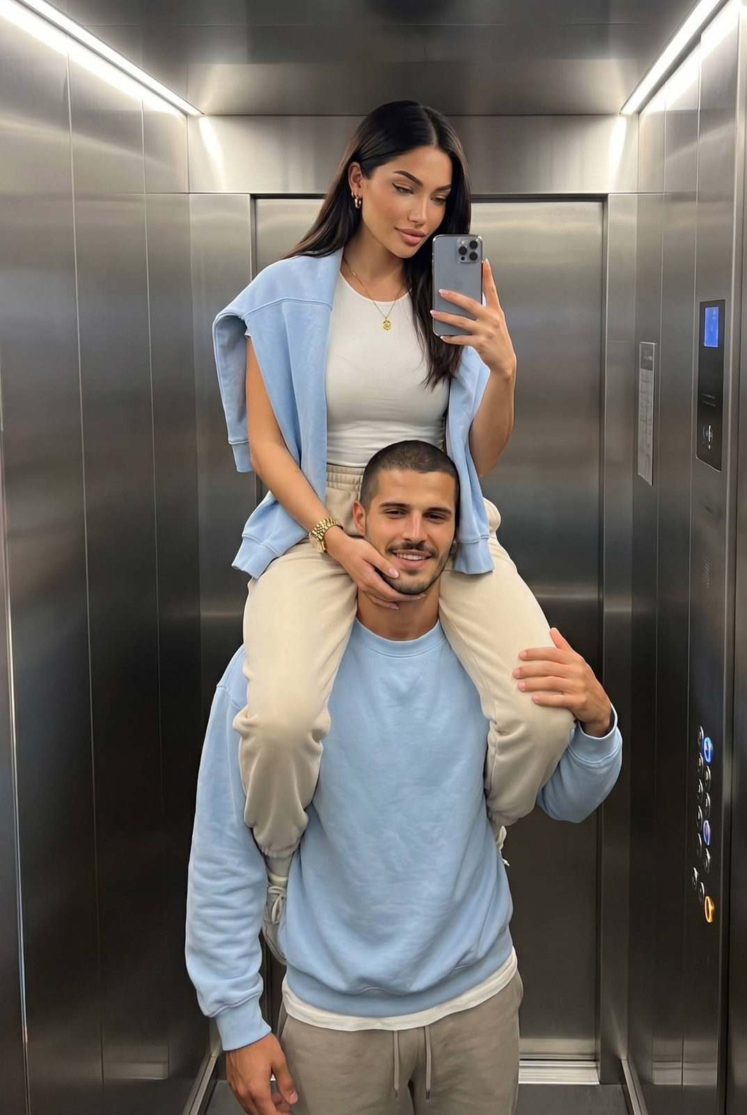 Elevator Couple Shoulder Selfie
