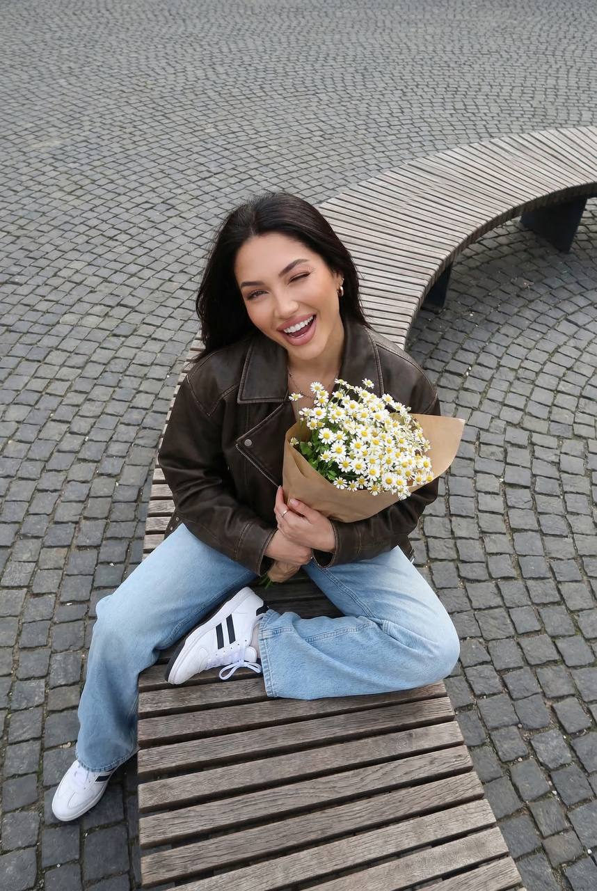 Playful Street Portrait With Flowers