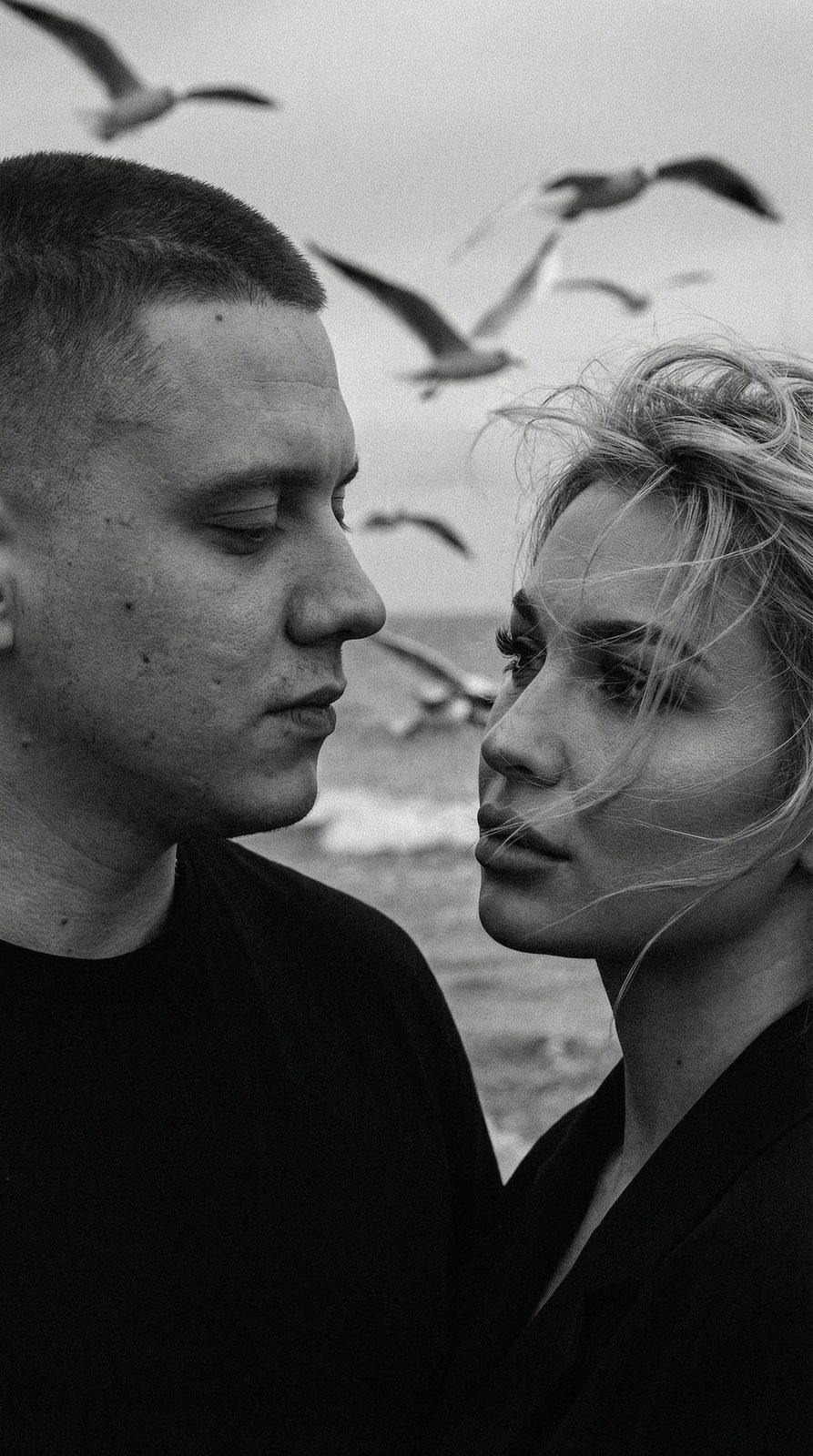 Dramatic B&W Couple Portrait By Sea