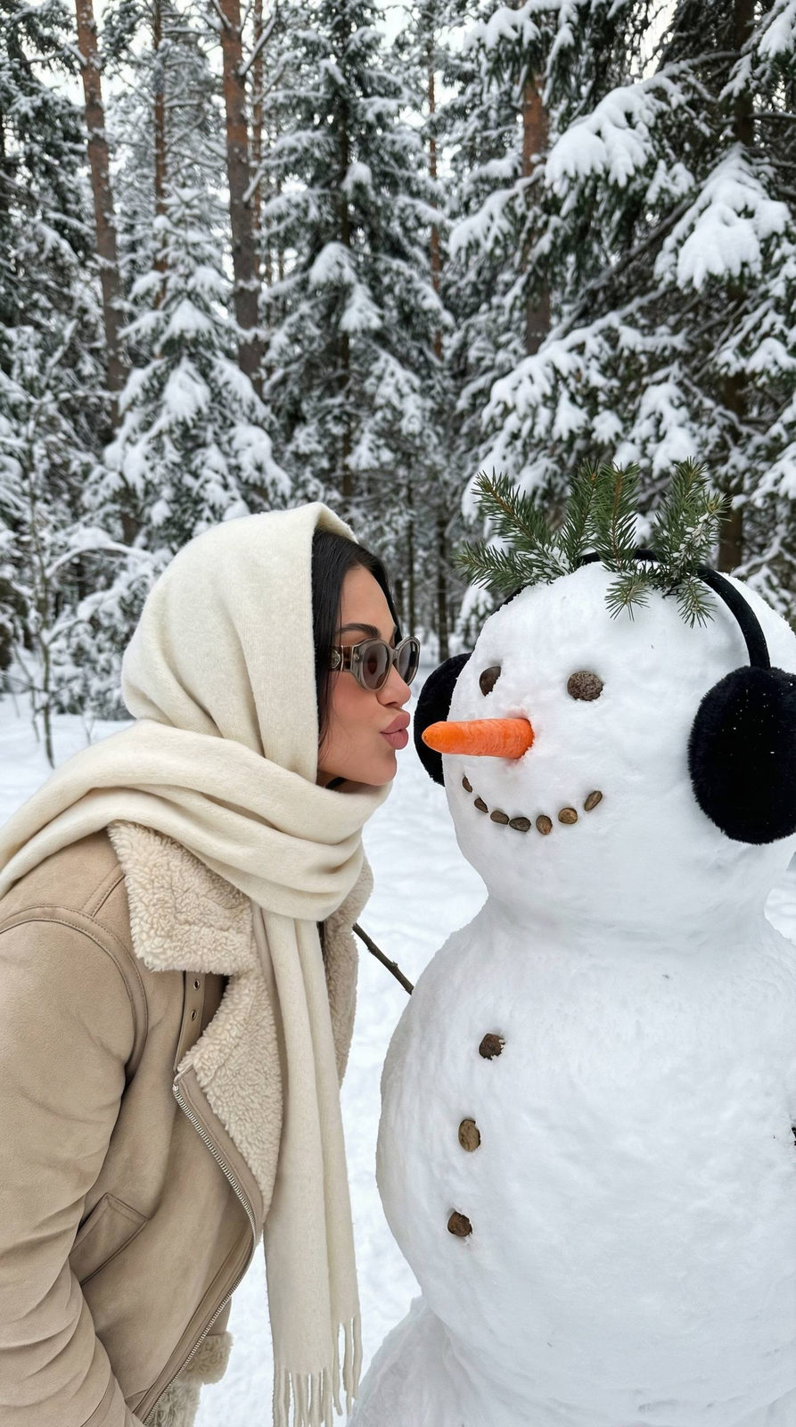 Playful Snowman Kiss in Winter Forest
