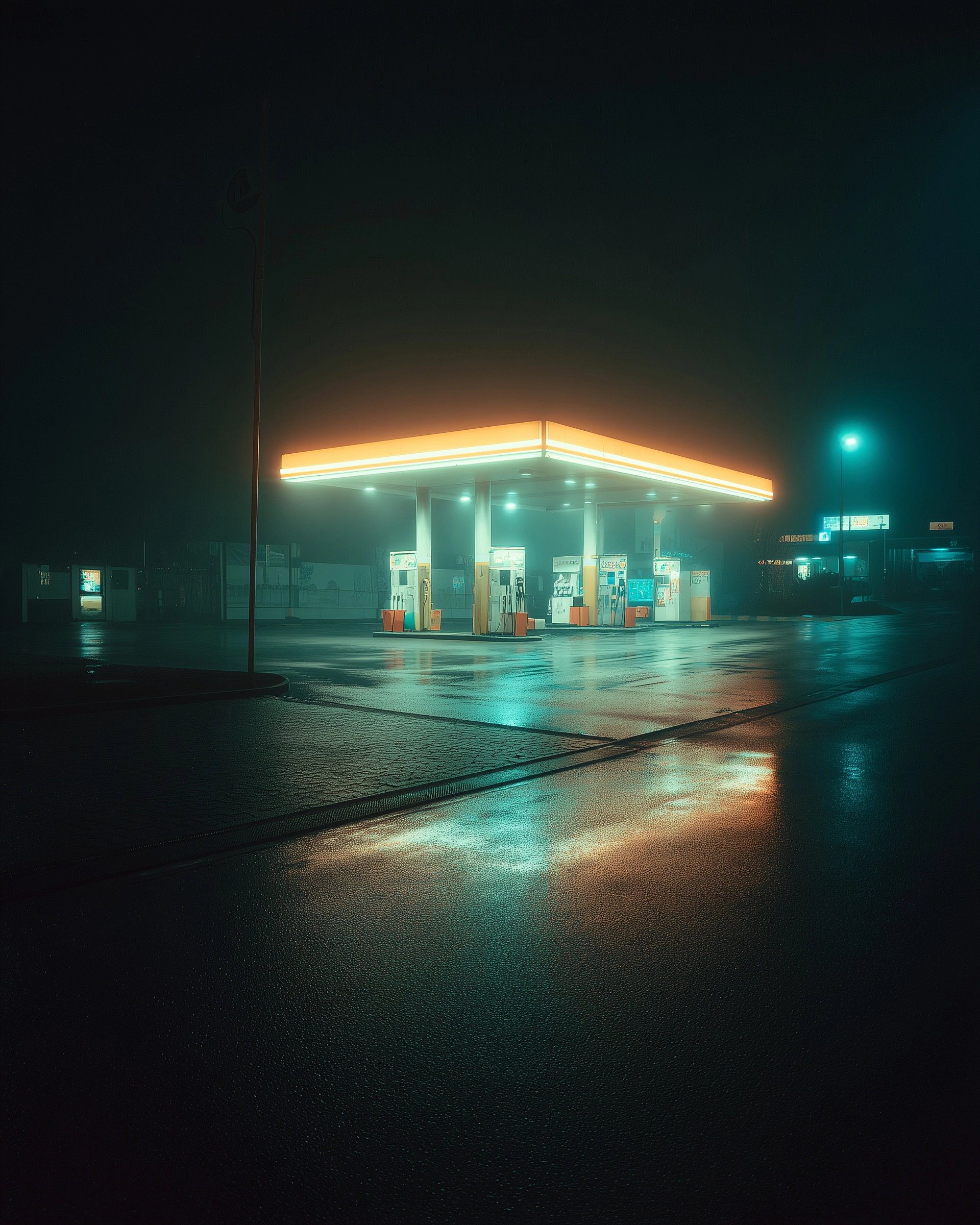 Empty gas station at night, wet asphalt reflecting neon lights, cinematic lighting