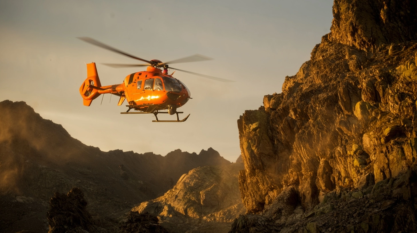 Locked two meters behind the EC135's tail boom, the orange rescue bird banks hard left around a gran