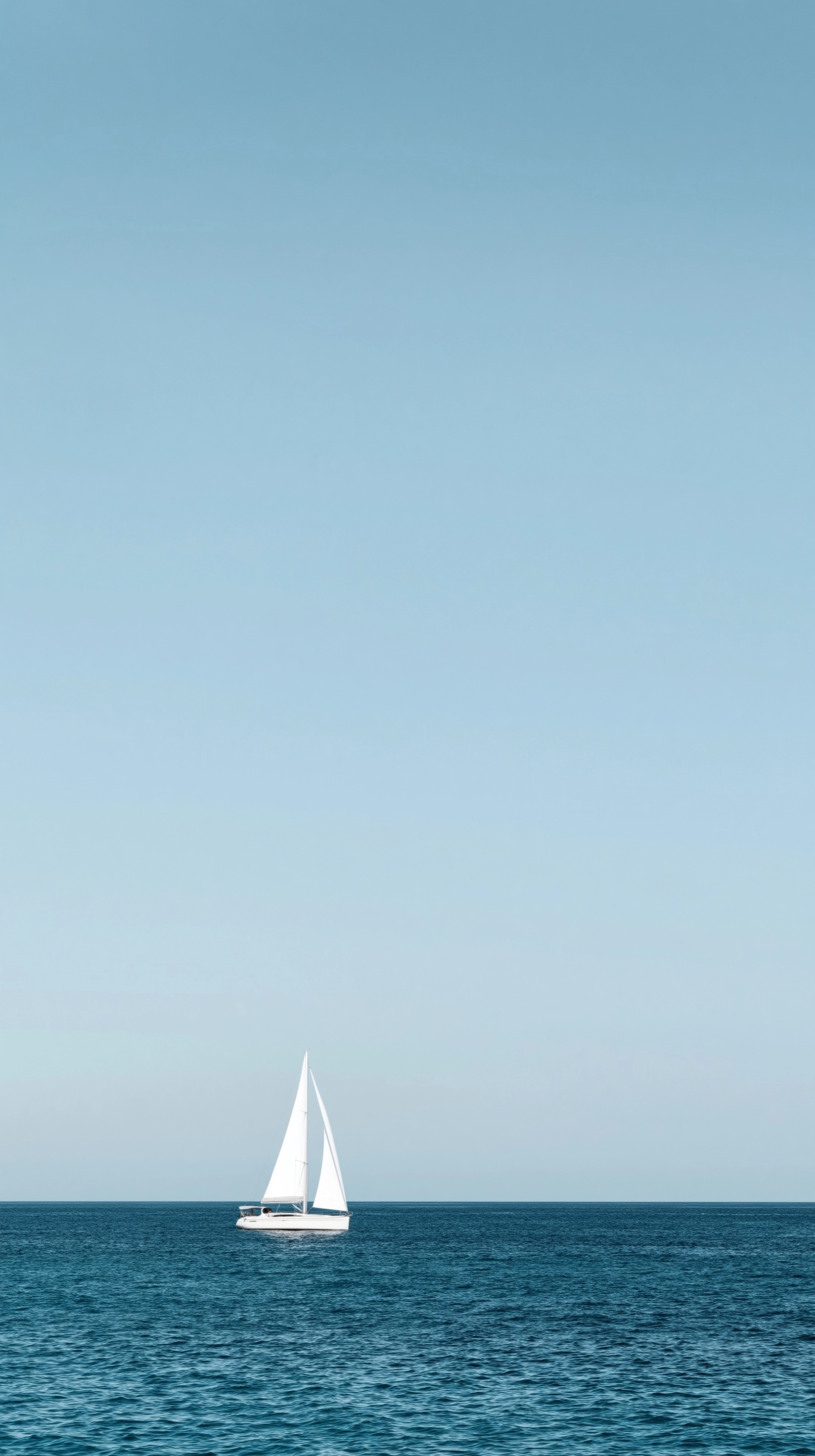 A minimalist travel photograph of a sailboat, styled after the sleek white sailboat with two triangu