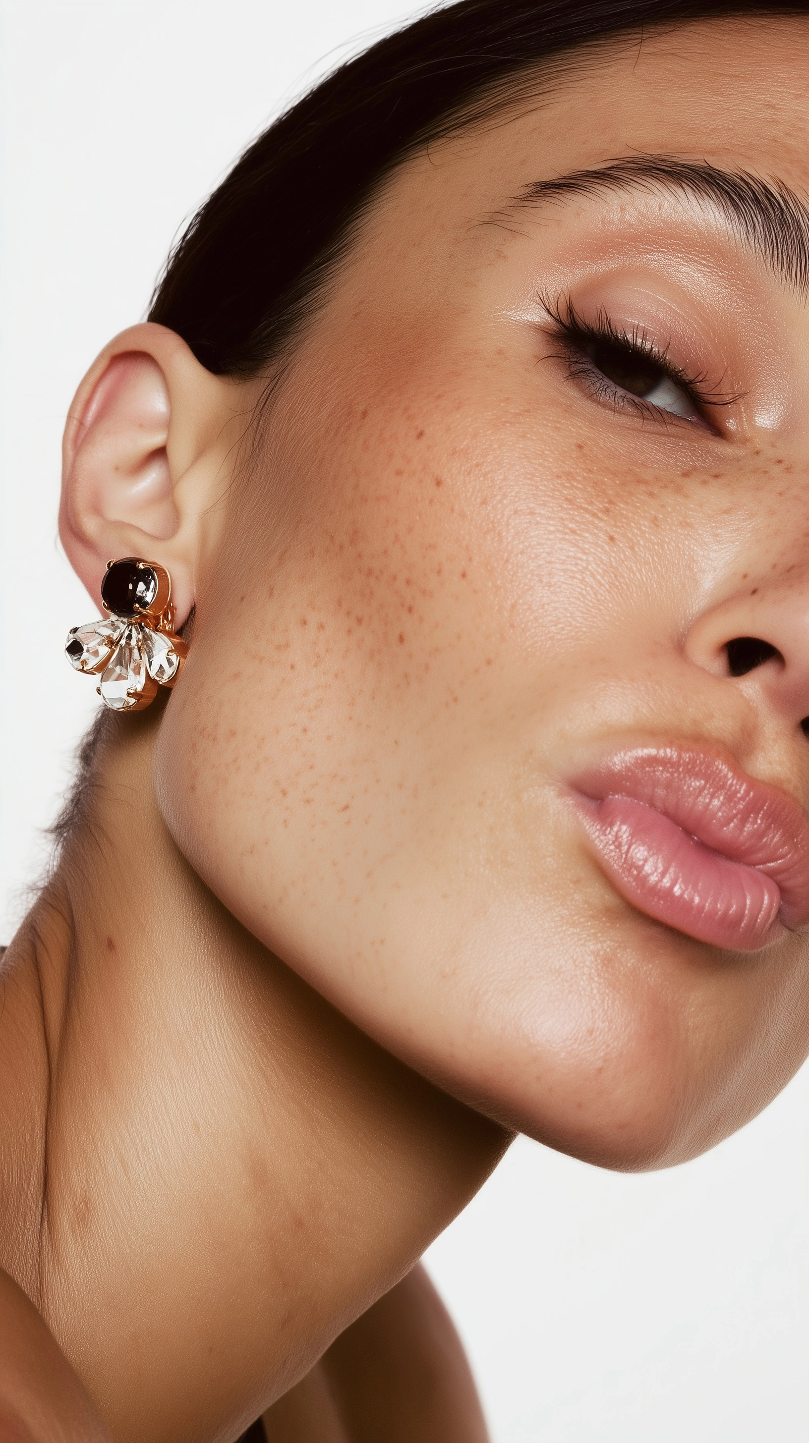 Side profile beauty portrait of an attractive woman around 30 years old, clean healthy skin