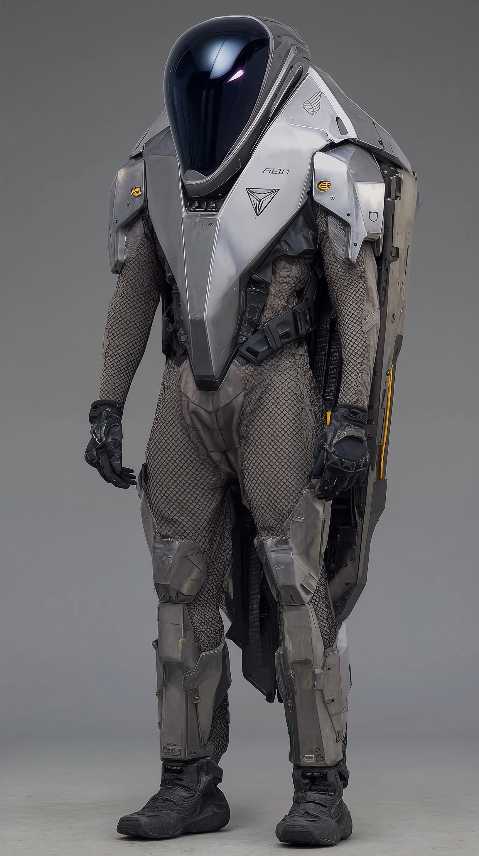 A alien figure with a armoured race suite in stainless steel panels over high tech material mesh fab