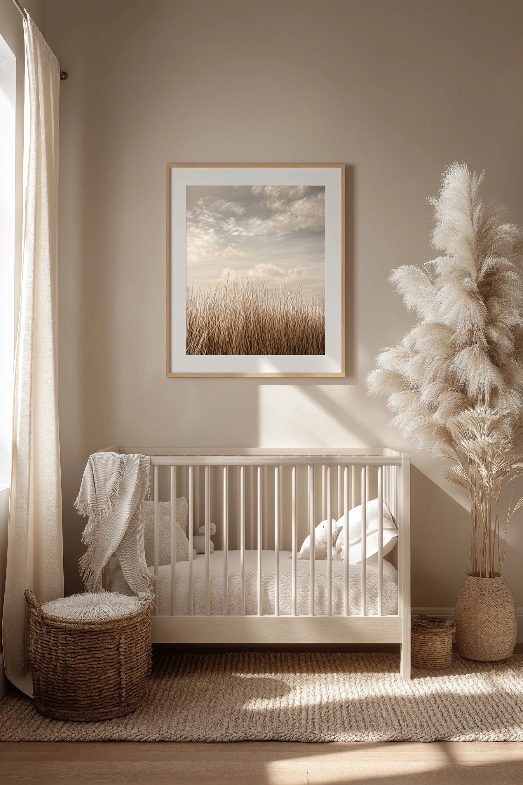 Boho nursery room, 18x24 framed wall art above crib, pampas grass decor, warm beige tones