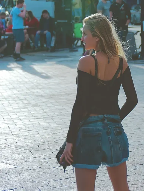 A girl doing street pranks on random guys.